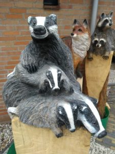 Houten beeld Dassen